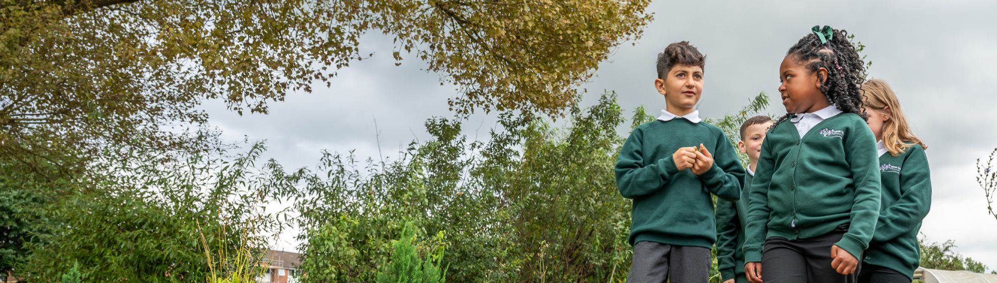 Moss Valley Primary Academy pupils in the school grounds
